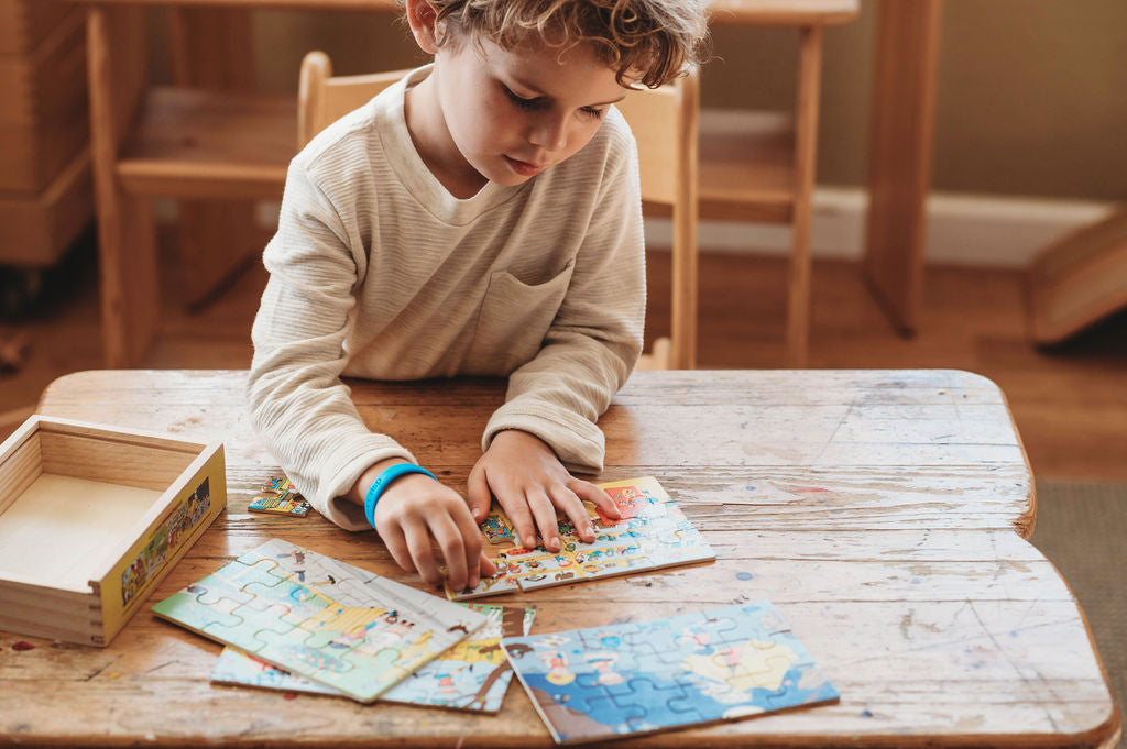 Boy solving a puzzle