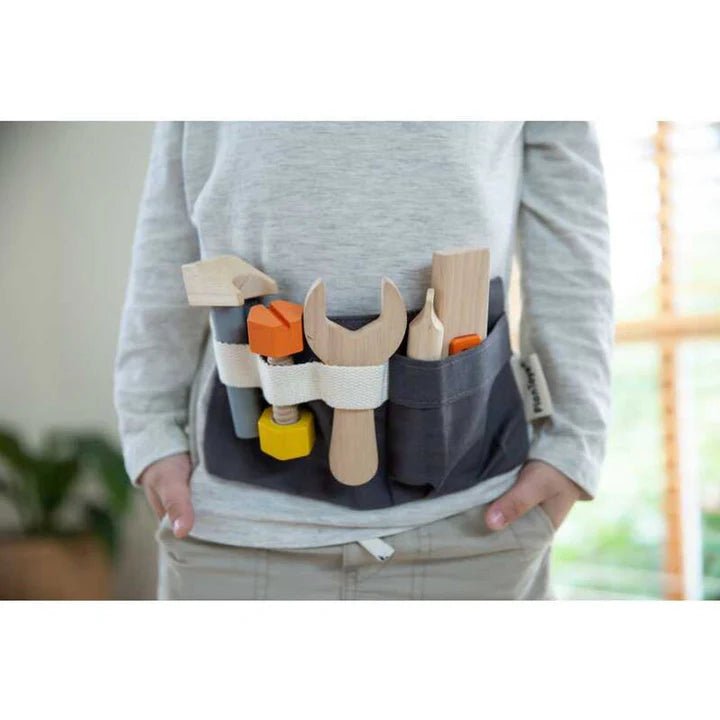 plan toys tool belt on child