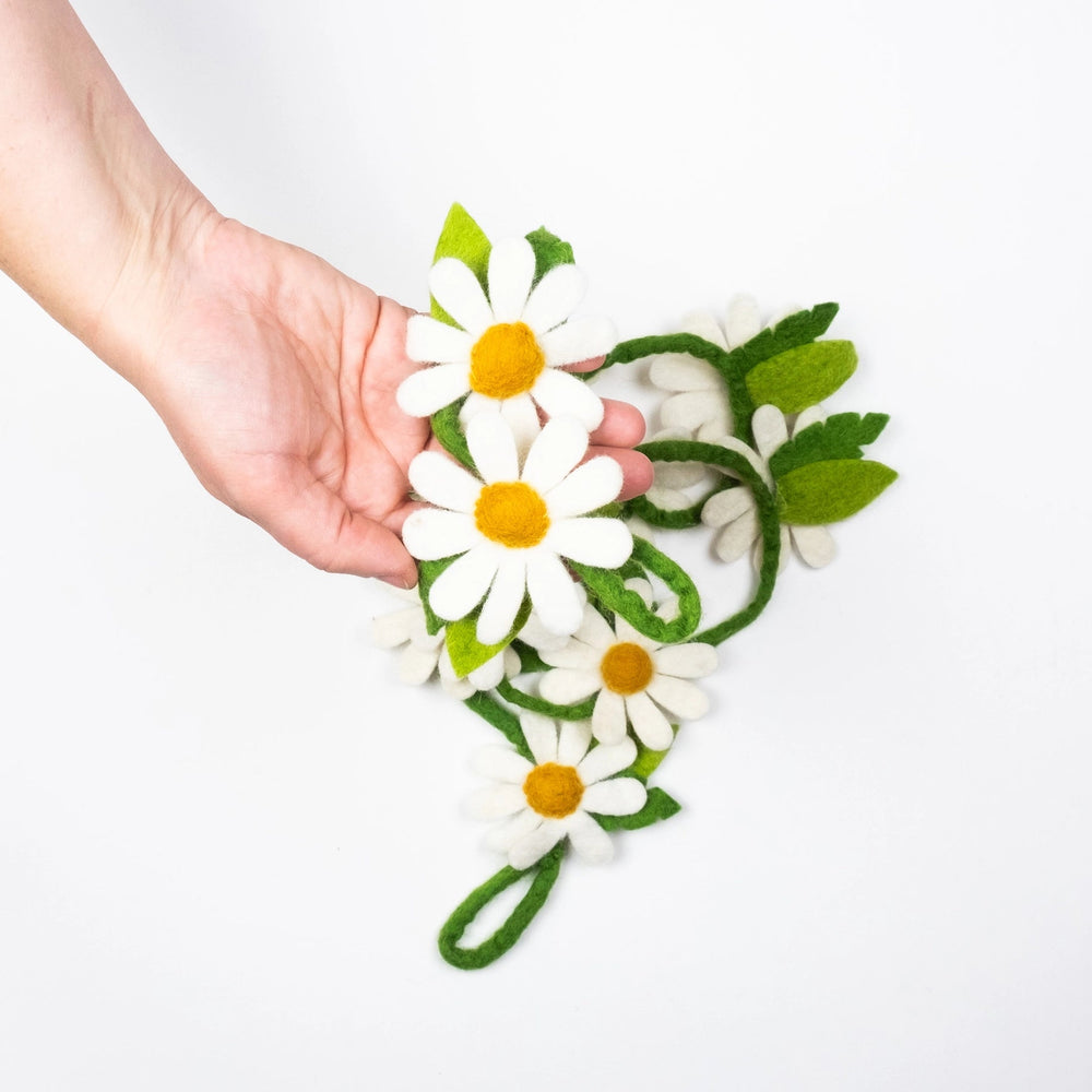 
                  
                    Winding Road Daisy Felt Garland in Hand
                  
                