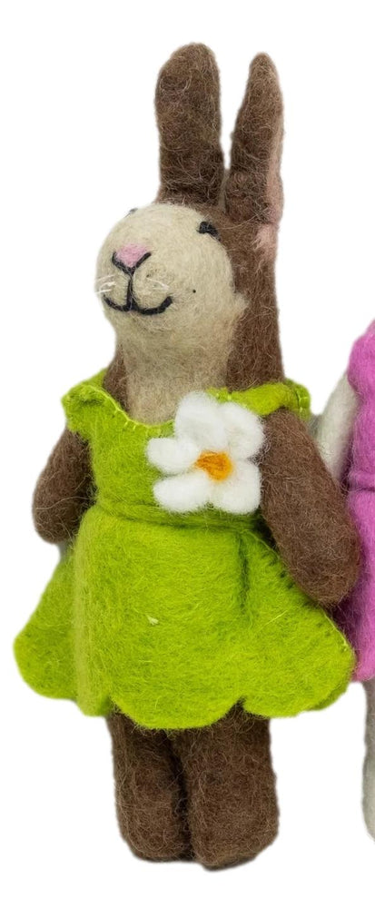 
                  
                    single fair trade felt bunny in green outfit by the winding road
                  
                