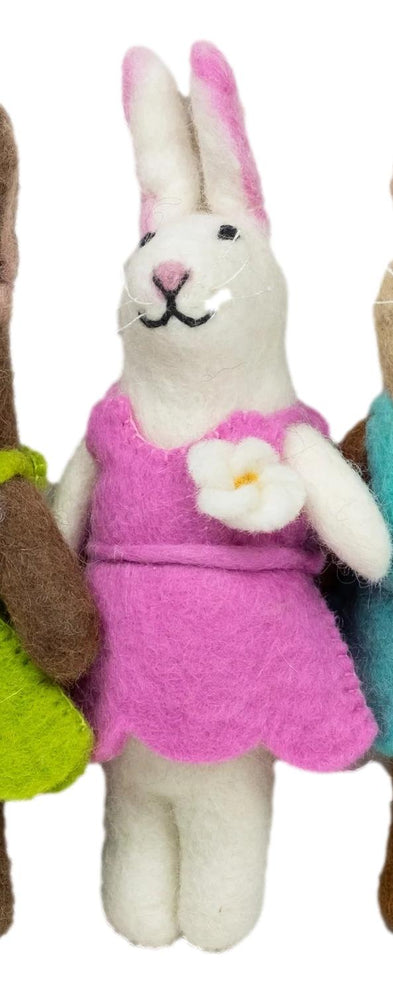 
                  
                    single fair trade felt bunny in pink outfit by the winding road
                  
                