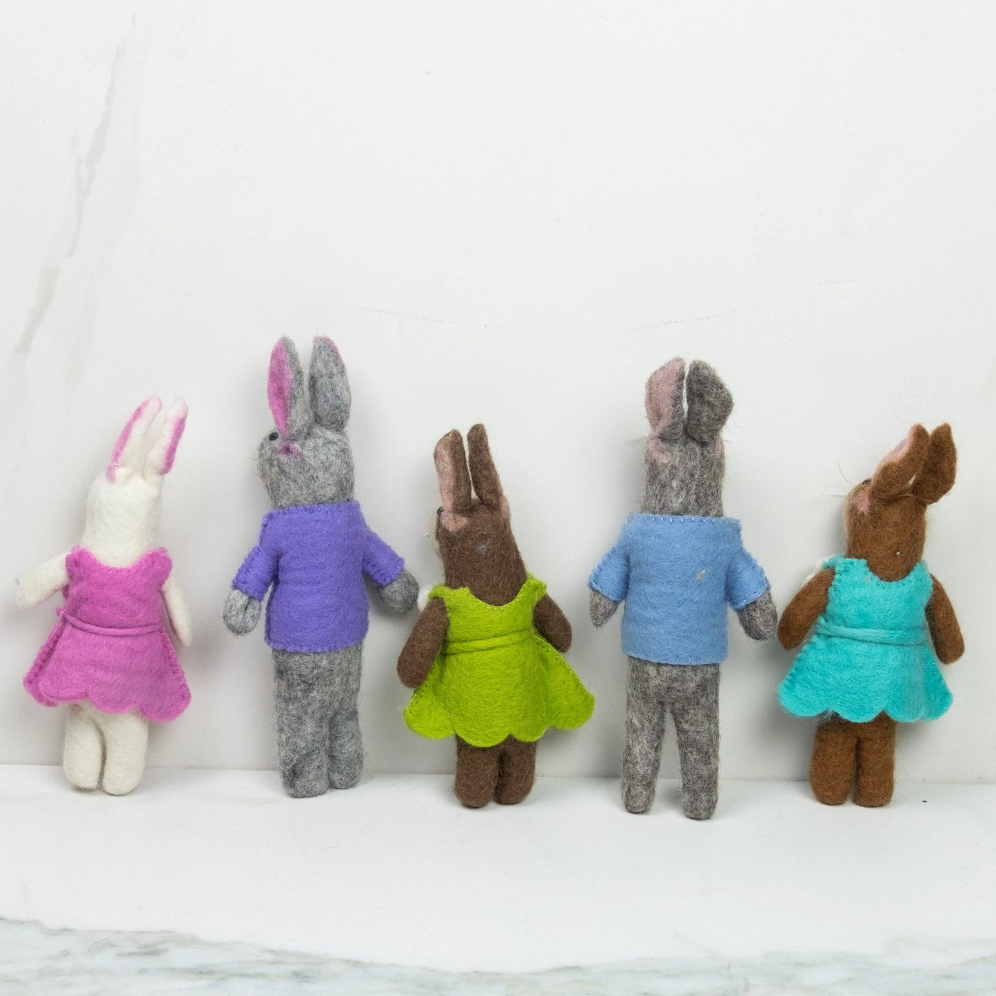 
                  
                    fair trade felt bunny set rear view by the winding road
                  
                