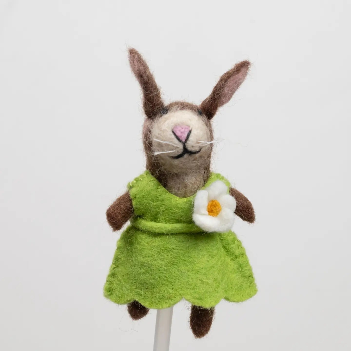 
                  
                    Green felt bunny rabbit finger puppet from the winding road
                  
                