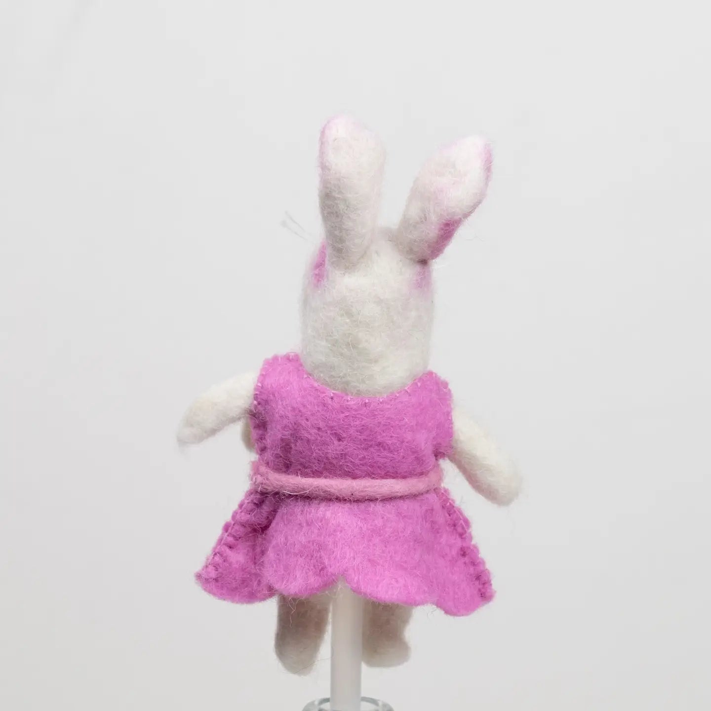 
                  
                    Backside of pink felt bunny rabbit finger puppet from the winding road
                  
                