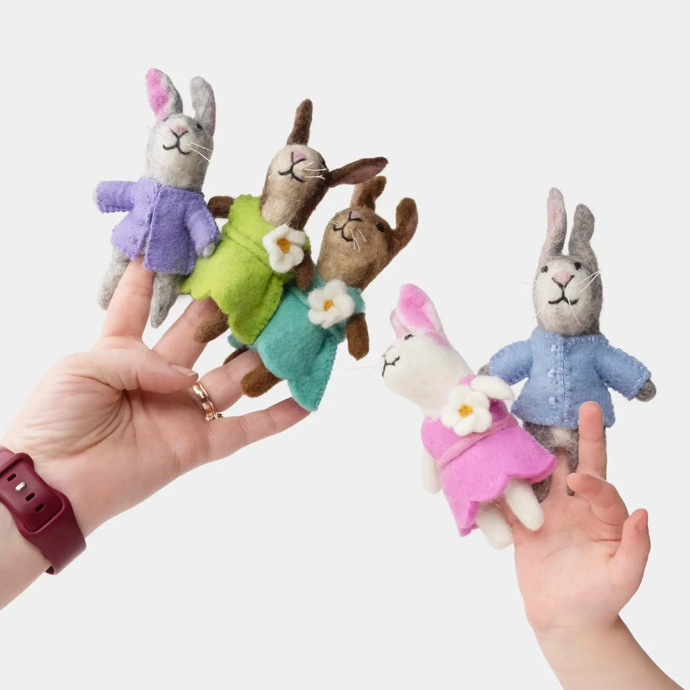 Assorted felt bunny rabbit finger puppets from the winding road on two hands