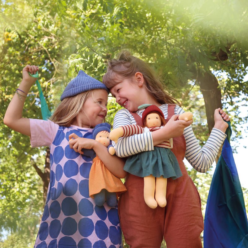 Children with Nanchen Chestnut Karlotta doll and Madchen doll