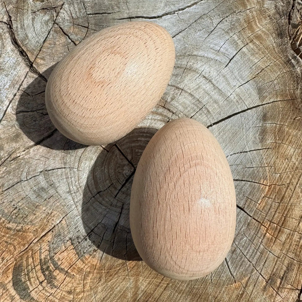 
                  
                    all wooden elements egg shakers unfinished on stump
                  
                